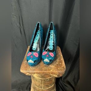 Size: 7 Iron Fist Rock Star
Sugar skull heels